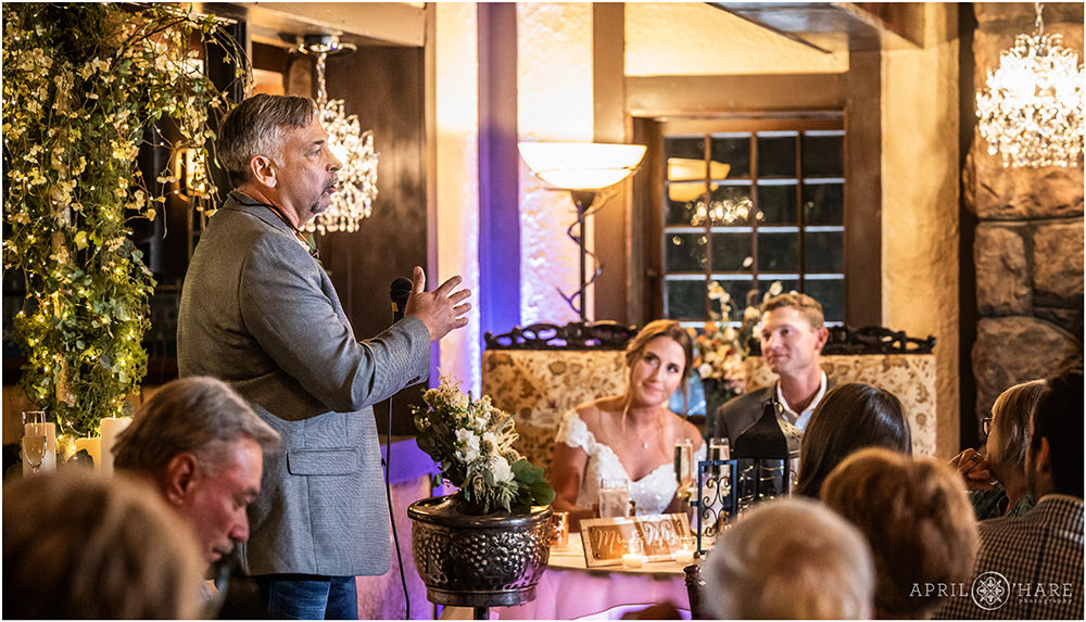 Father of the bride gives a speech at her wedding at the Craftwood Inn in Colorado Springs CO
