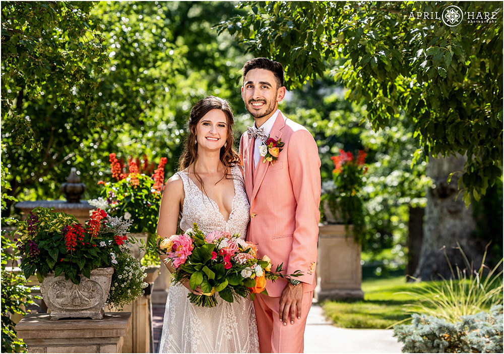 Classic Portrait of Bride and groom in the garden on a hot sunny summer day at Grant-Humphreys Mansion in Denver