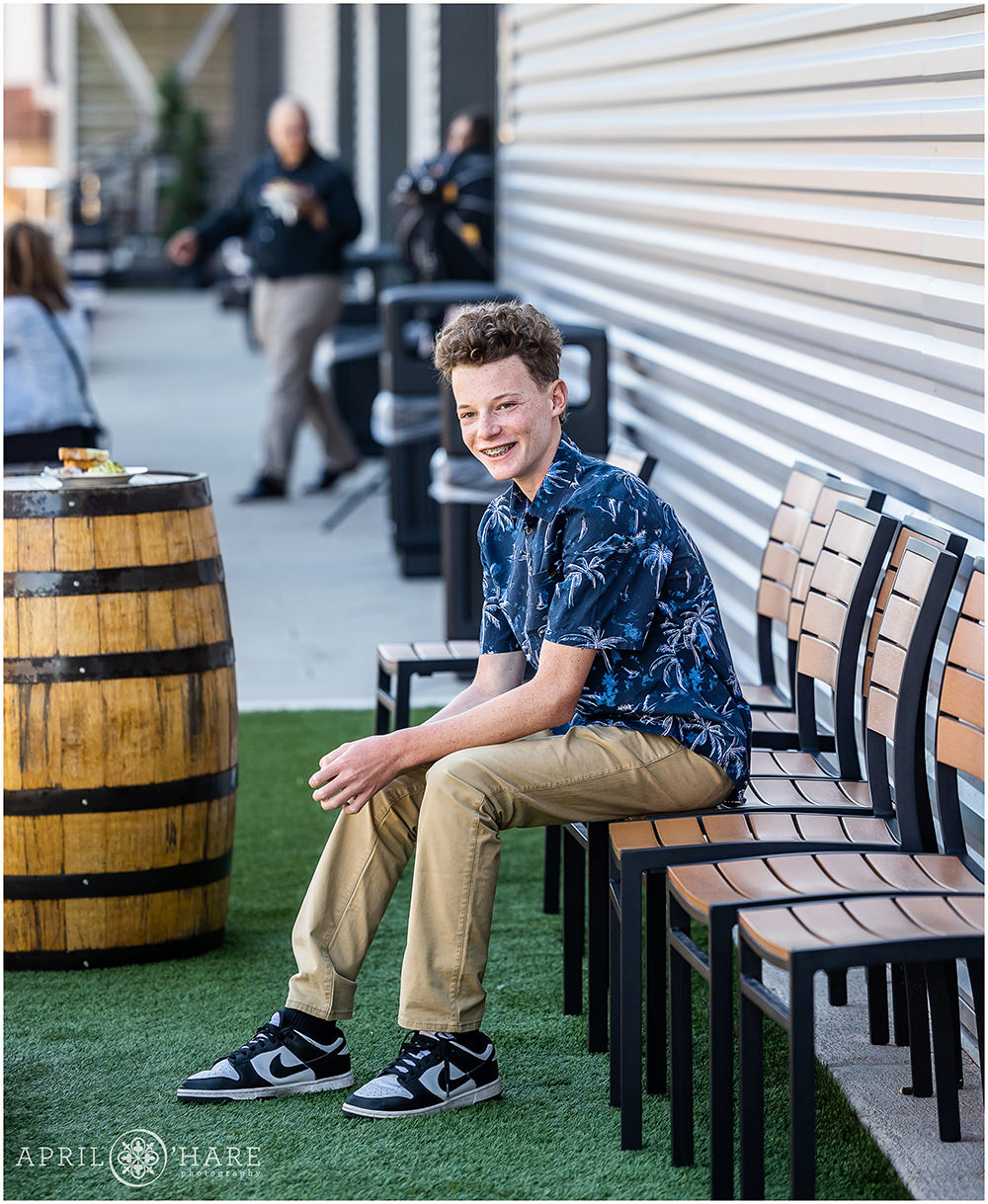 Kid hanging out on the patio at Pindustry at a bar mitzvah party