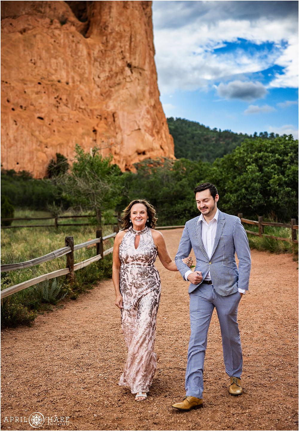 Mother of the bride walks down the aisle at Garden of the Gods in Colorado Springs CO