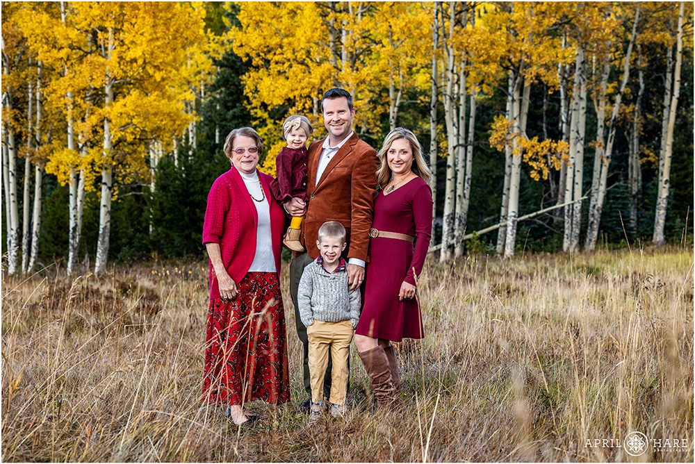 A grandmother gets a beautiful photo with her son and his family in the fall color on Squaw Pass Road during fall