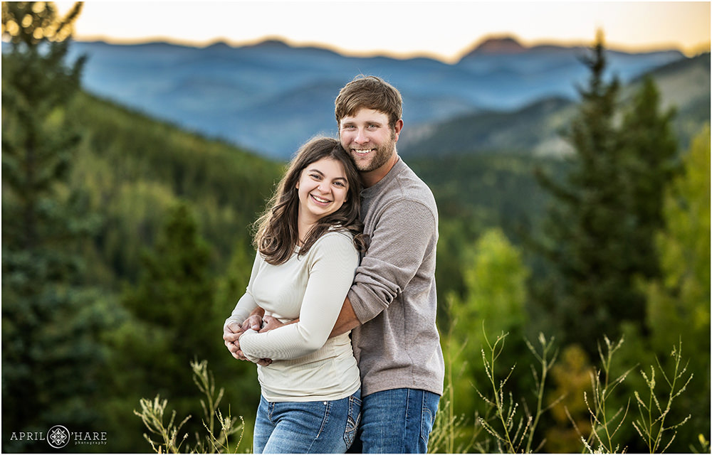 Beautiful couples portrait with mountain backdrop in Evergreen Colorado