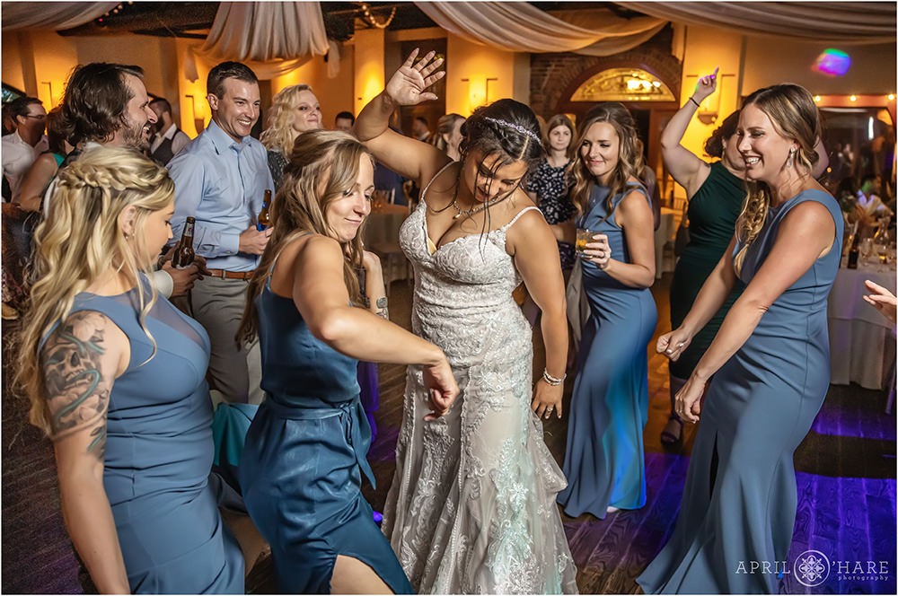 Bride dancing with her friends at Wellshire Event Center