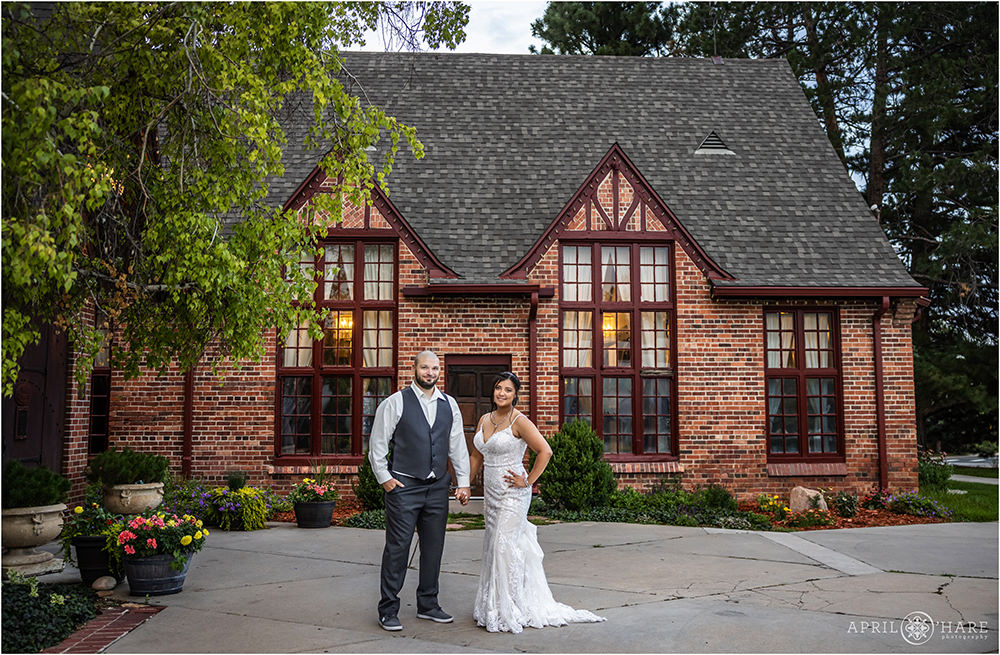 Beautiful portrait of bride and groom in the front courtyard area of Wellshire Event Center