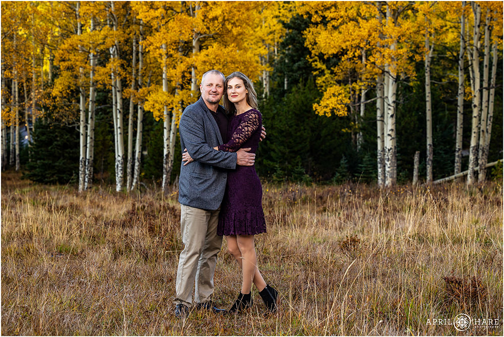 Gorgeous couple photo in the fall color on Squaw Pass Road in Colorado