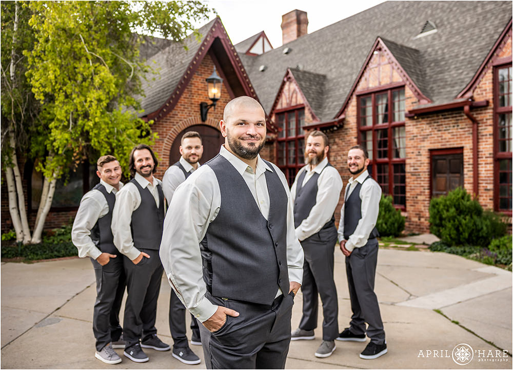 Groom portrait with his groomsmen at Wellshire Event Center