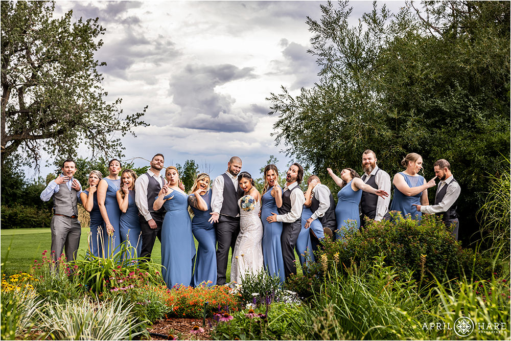 Fun wedding party photo in the garden at Wellshire Event Center