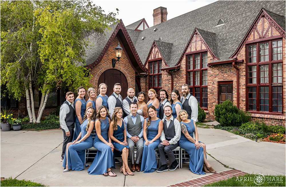 Classic large wedding party portrait in front of the Wellshire Event Center in Denver