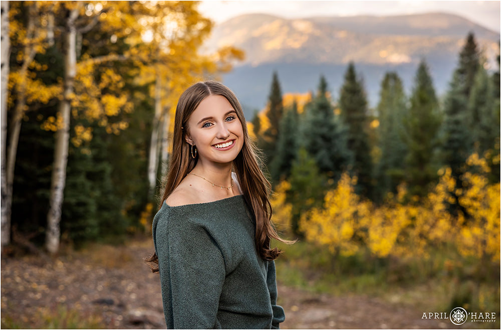 High school senior portrait in Evergreen during fall color season