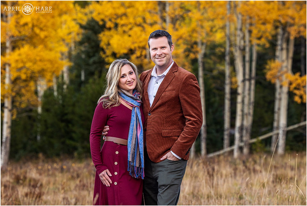 Beautiful couples portrait in the autumn colors on Squaw Pass Road in Colorado