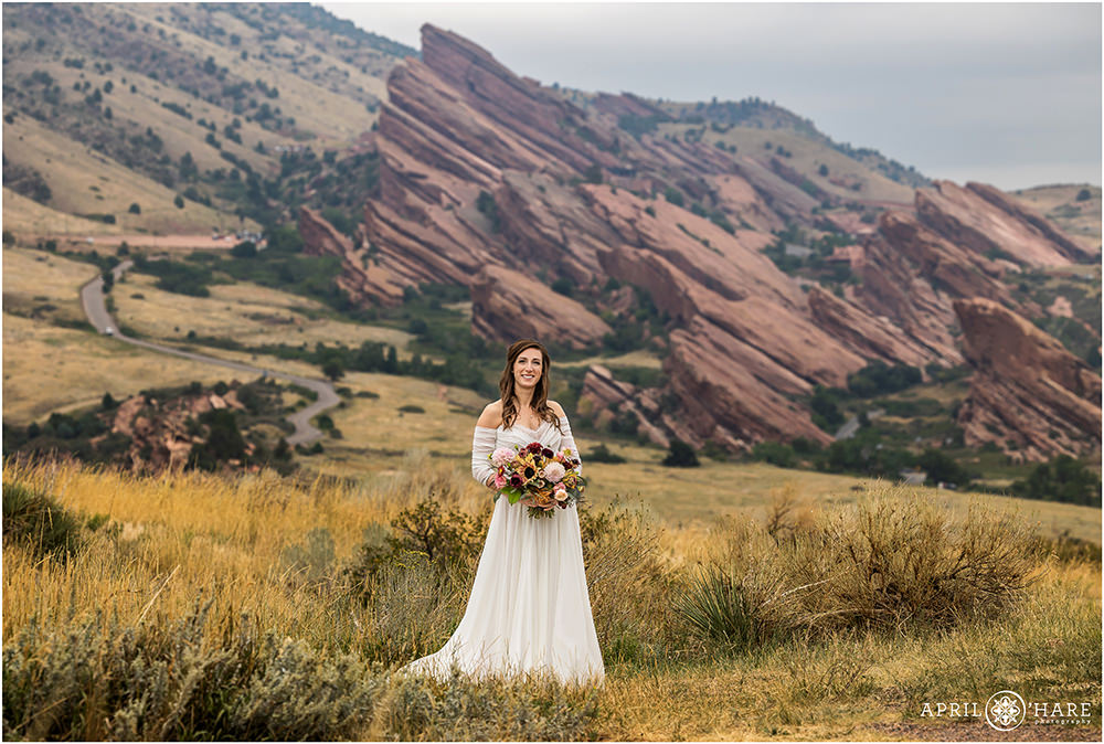 Gorgeous bridal portrait at East Mount Falcon Trailhead with Red Rocks backdrop