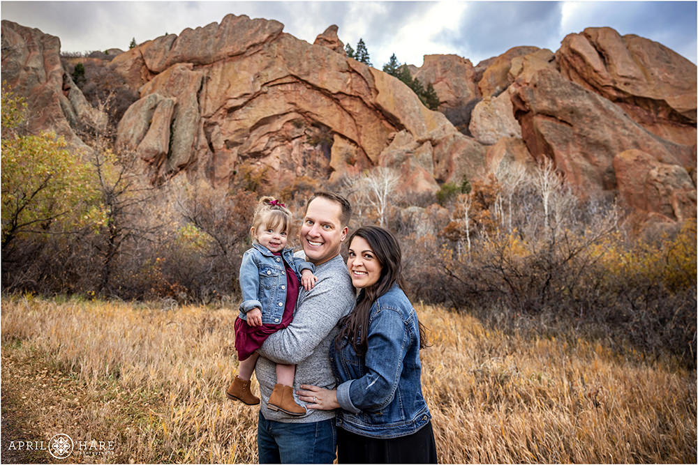 Sweet family photo during fall at Roxborough State Park in Colorado