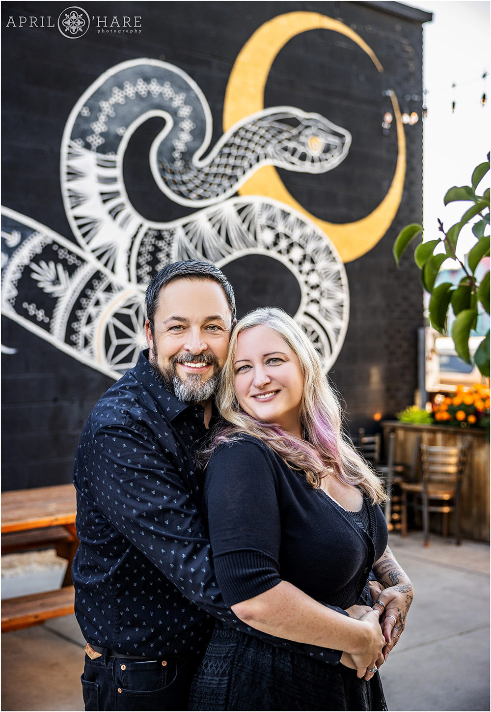 Gold Point Restaurant Snake Mural Couples Portrait in Rino Denver CO