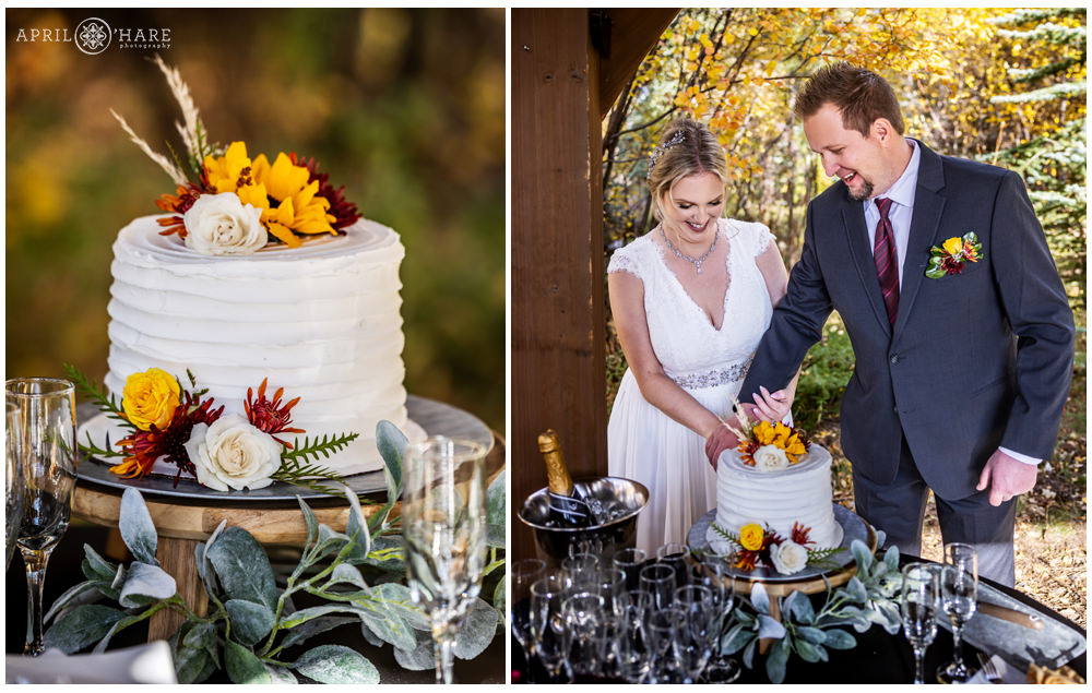 Bride and groom cut a pretty little white cake decorated with fall florals at Romantic Riversong Inn in Estes Park Colorado