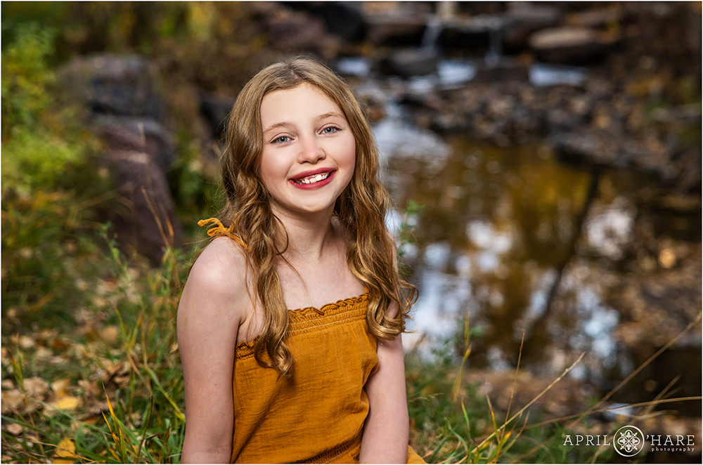 Tween girl at her family portrait session at James Bible Park during Autumn