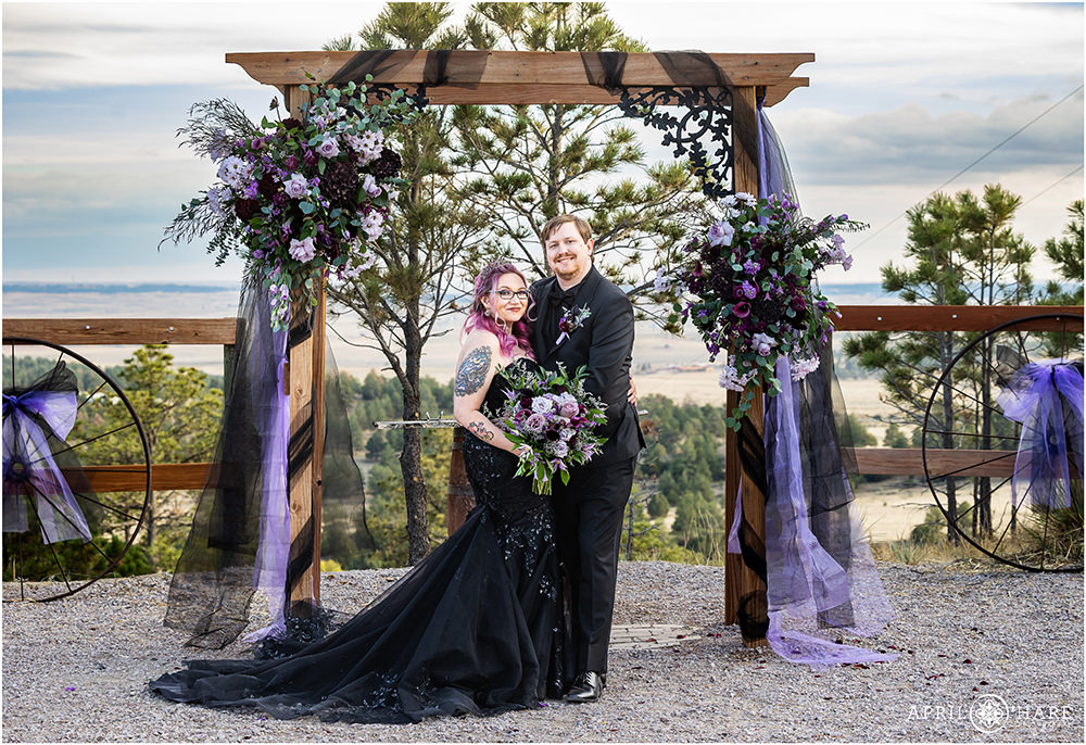 Wedding couple with Black and Purple decor at Once Upon a Time in Kiowa Colorado
