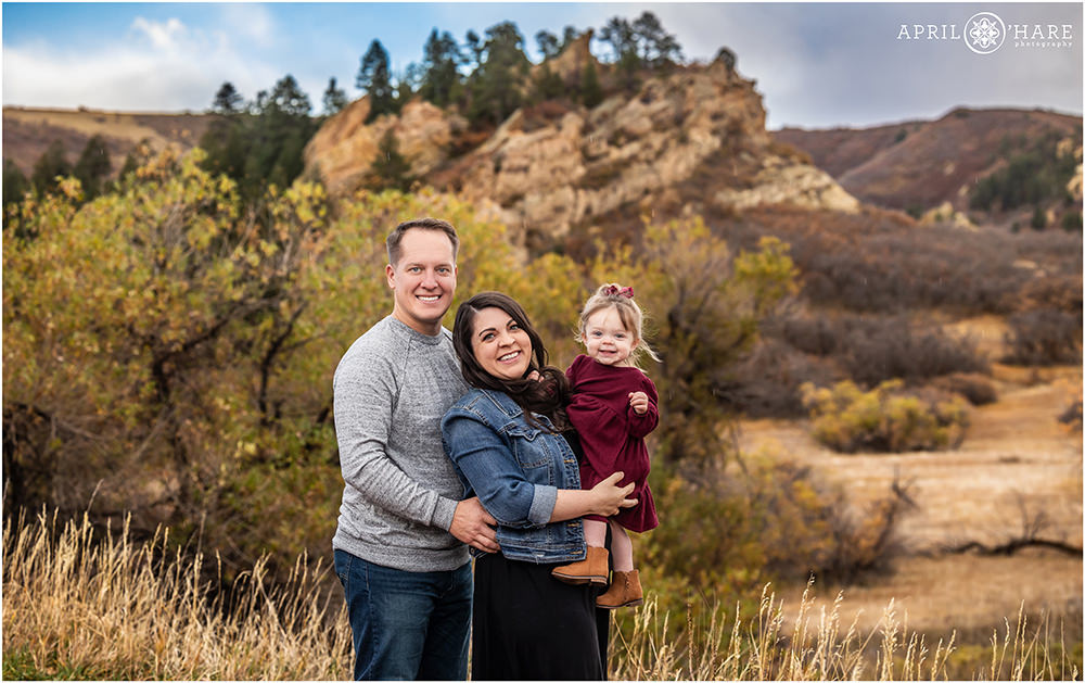 Beautiful family portrait created during fall at Roxborough State Park