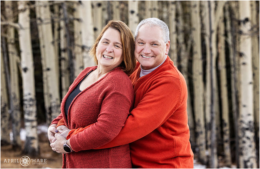 Grandparents get their own cute couples portrait in the aspen trees of Evergreen CO