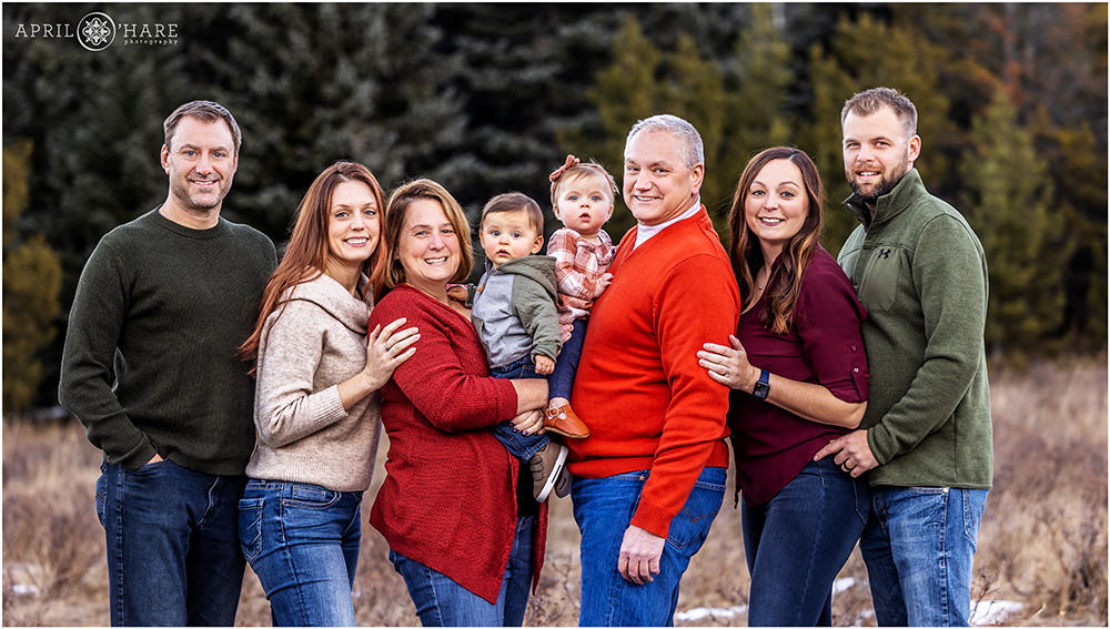 Extended family photo with two small baby twins in Evergreen CO during winter