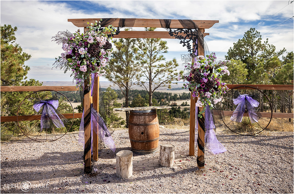Wedding arch decorated with Purple and Black at Once Upon a Time