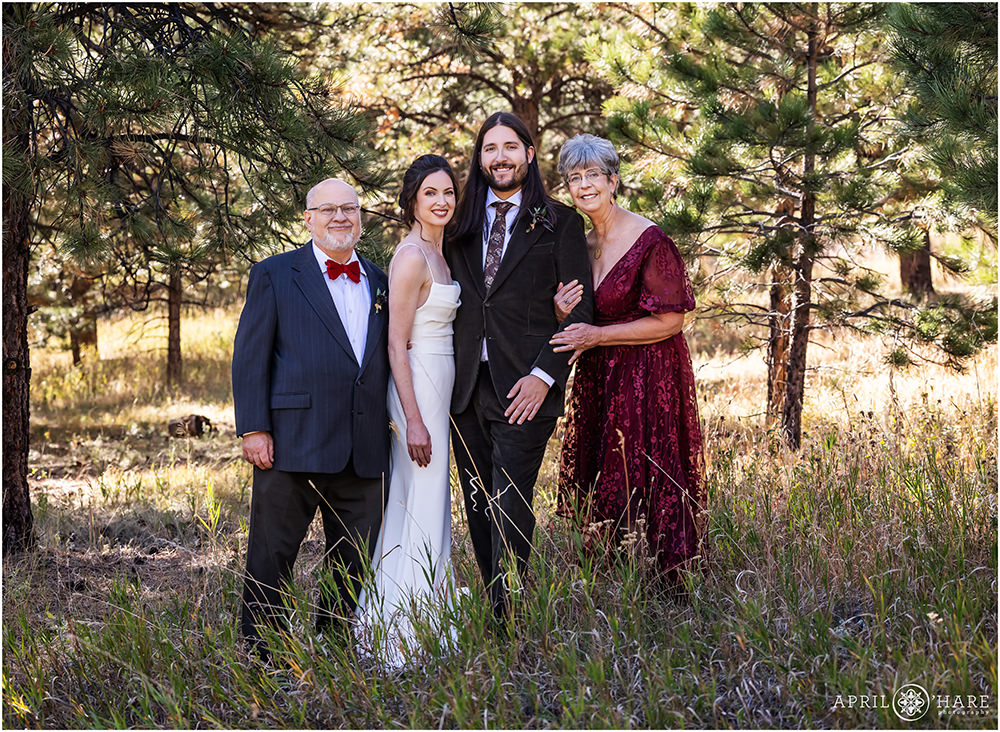 Beautiful forest family photo at Boettcher Mansion in the woods of Golden Colorado