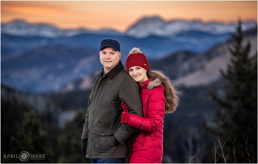 Beautiful sunset mountain backdrop for a Christmas family session in Colorado