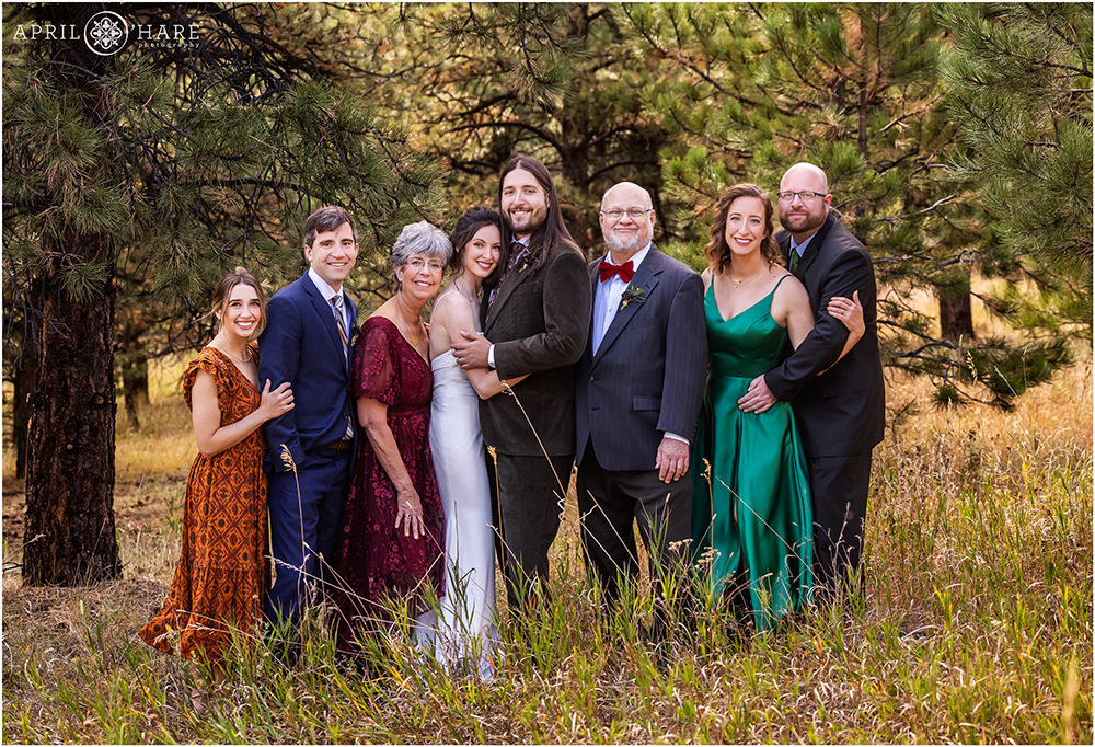 Pretty Colorful Family Portrait in the Woods at Boettcher Mansion in Colorado