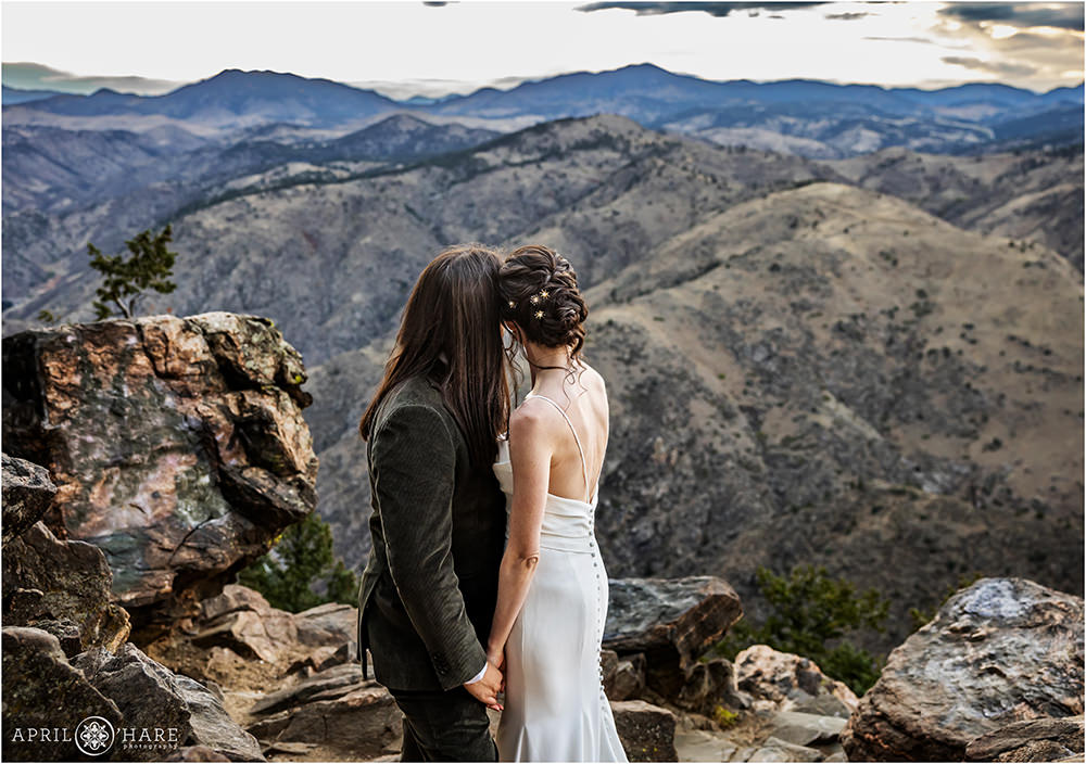 Stunning photo of a bride and groom looking out at the pretty mountain views on Lookout Mountain at Boettcher Mansion