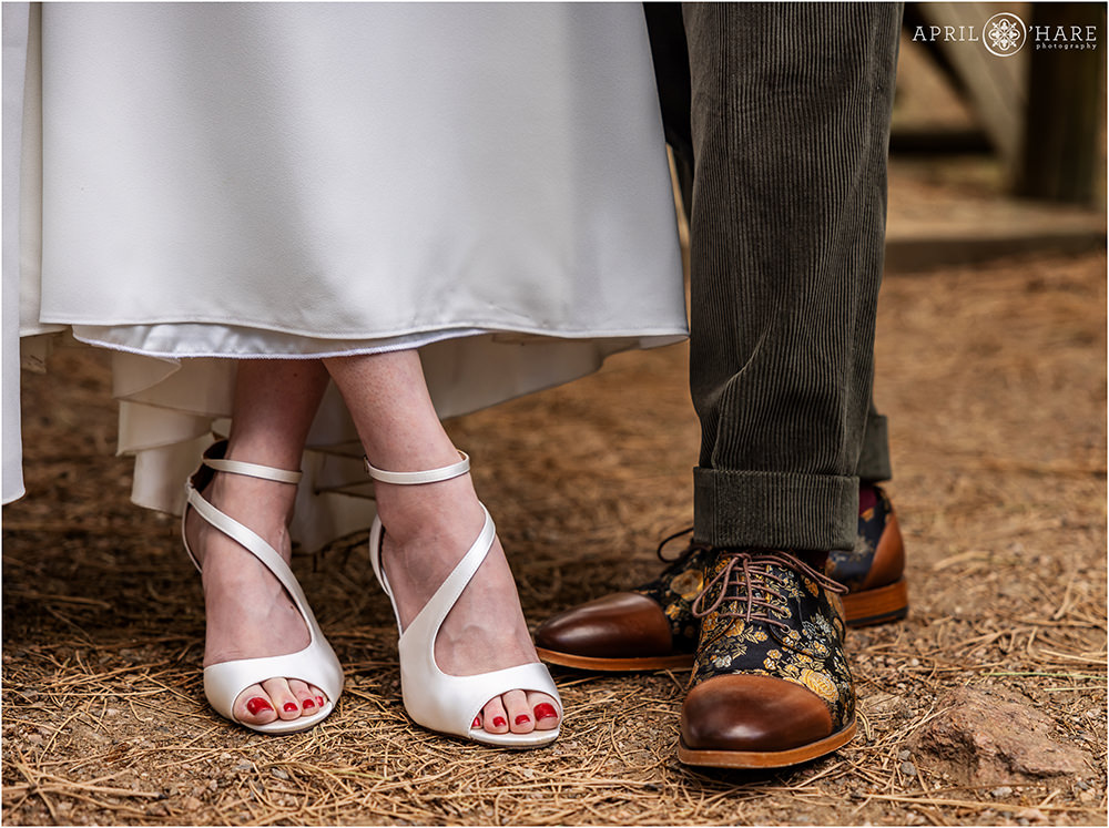 Cute detail photo of the bride and groom's shoes