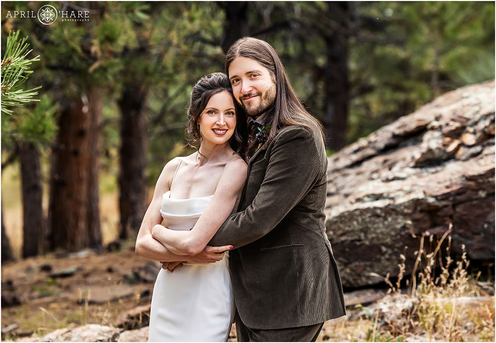 Cute wedding portrait in the woods at Boettcher Mansion in Colorado