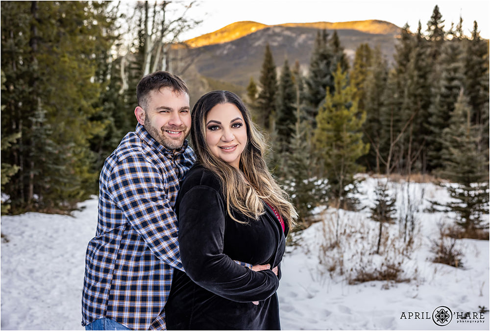 Pretty Colorado couples session during winter with snow on the ground in Evergreen