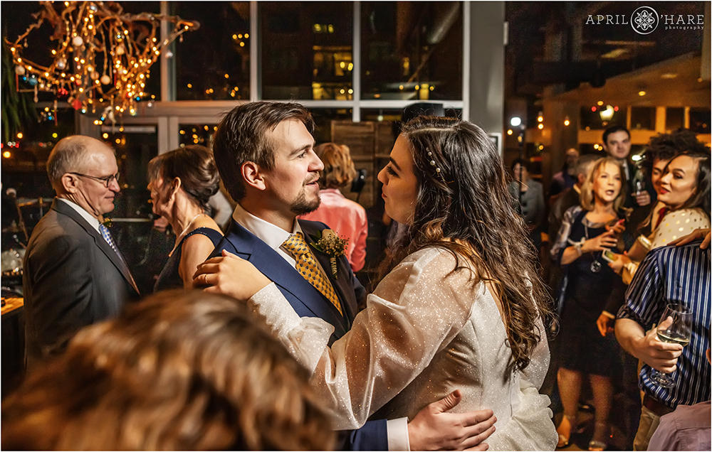 Bride and groom dance at Coohills on their NYE wedding day in Colorado