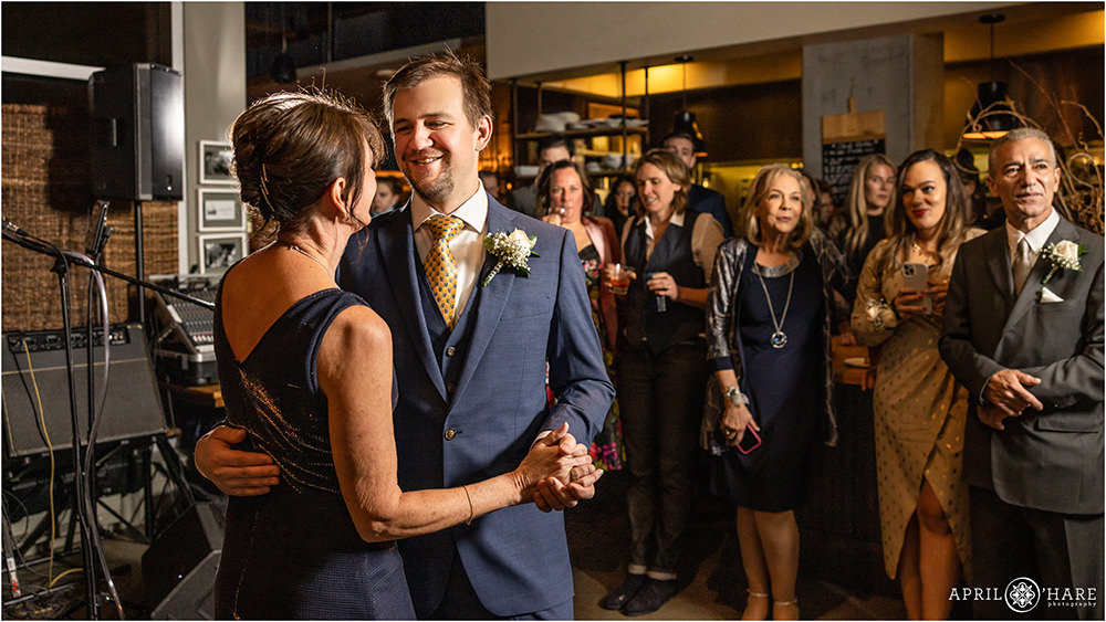 Groom dances with his mom at Coohills wedding in Denver
