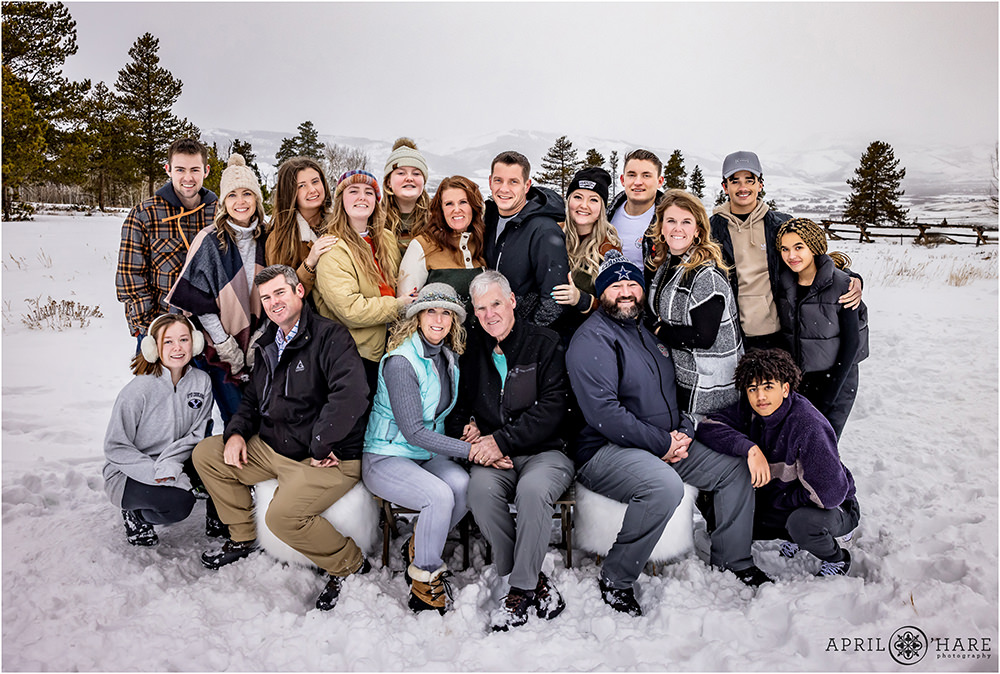 Large extended family porrait in the snow in Granby Colorado over Christmas break