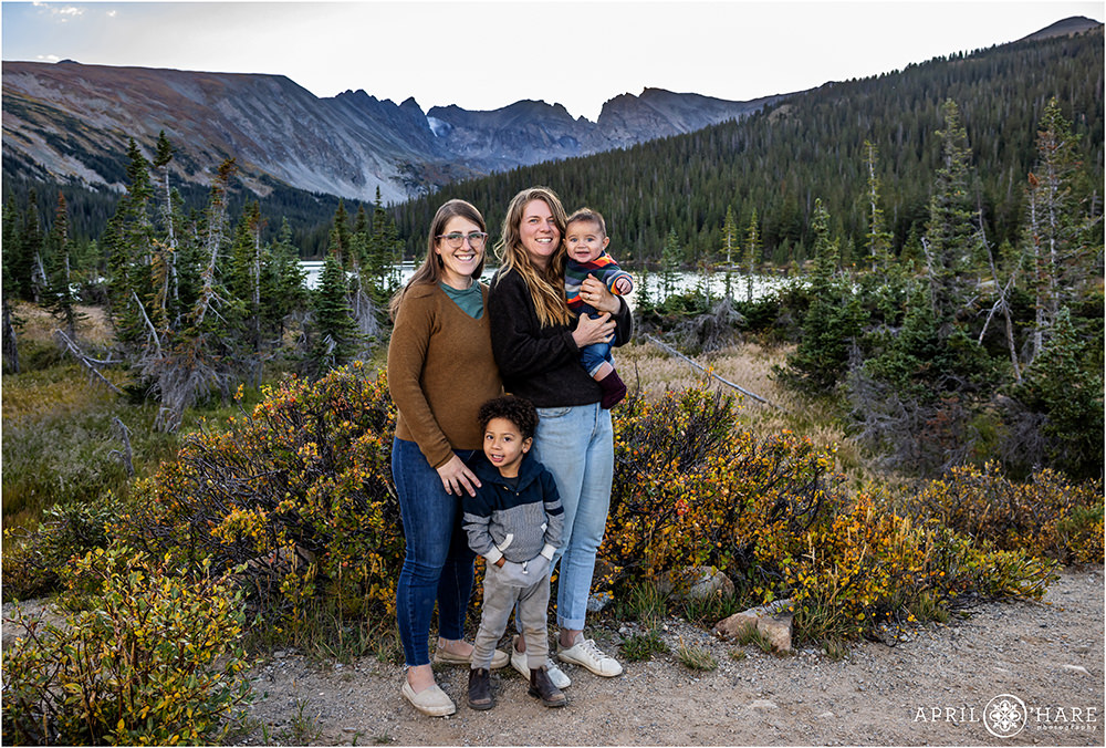Family of four photographed in front of Long Lake in Ward Colorado