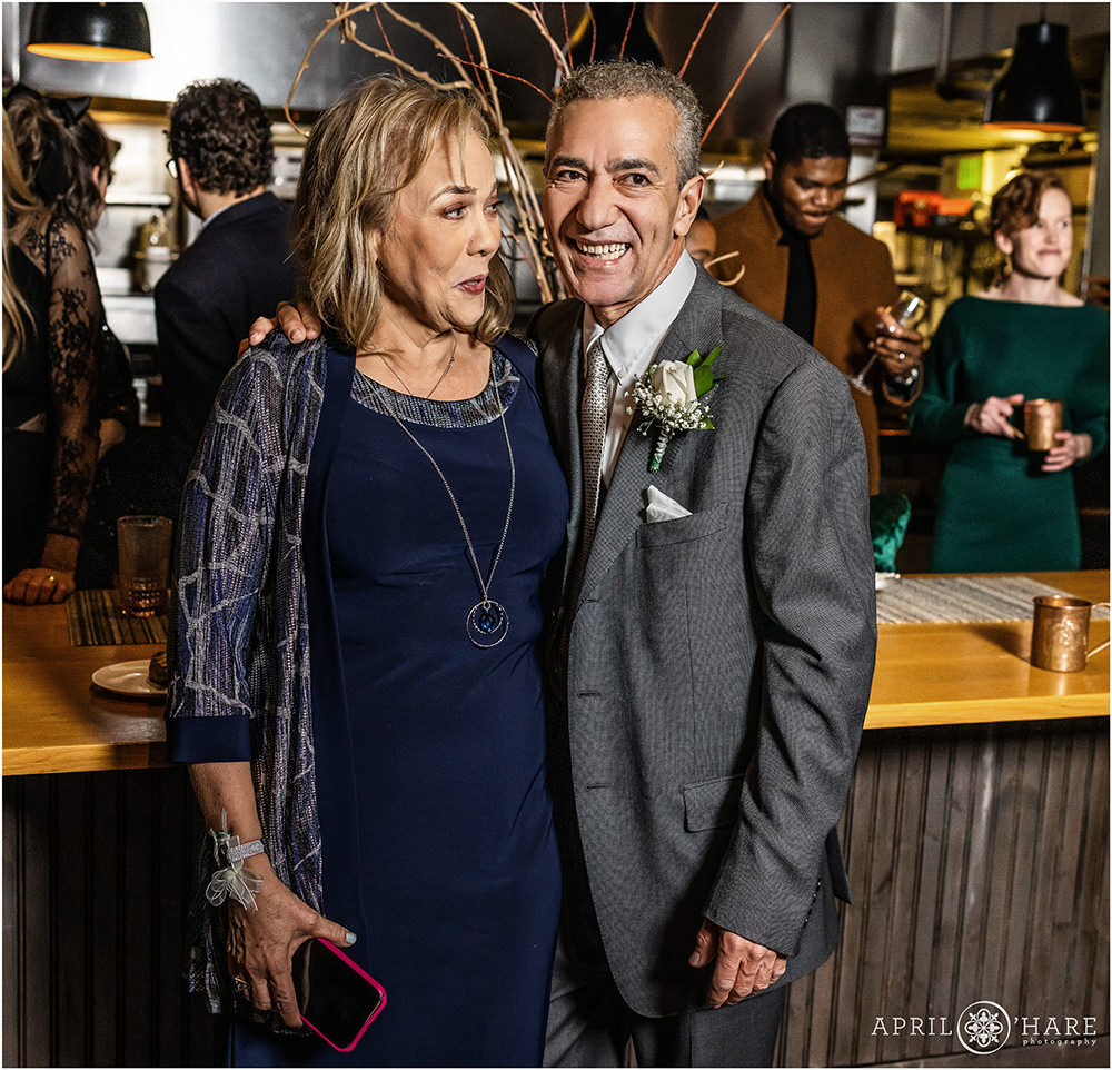 Parents of the bride enjoy her downtown Denver wedding at Coohills