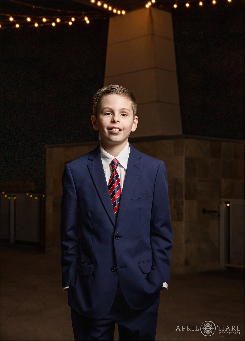 Nice simple portrait of a bar mitzvah boy on the outdoor patio area at Curtis Ballroom in Greenwood Village.