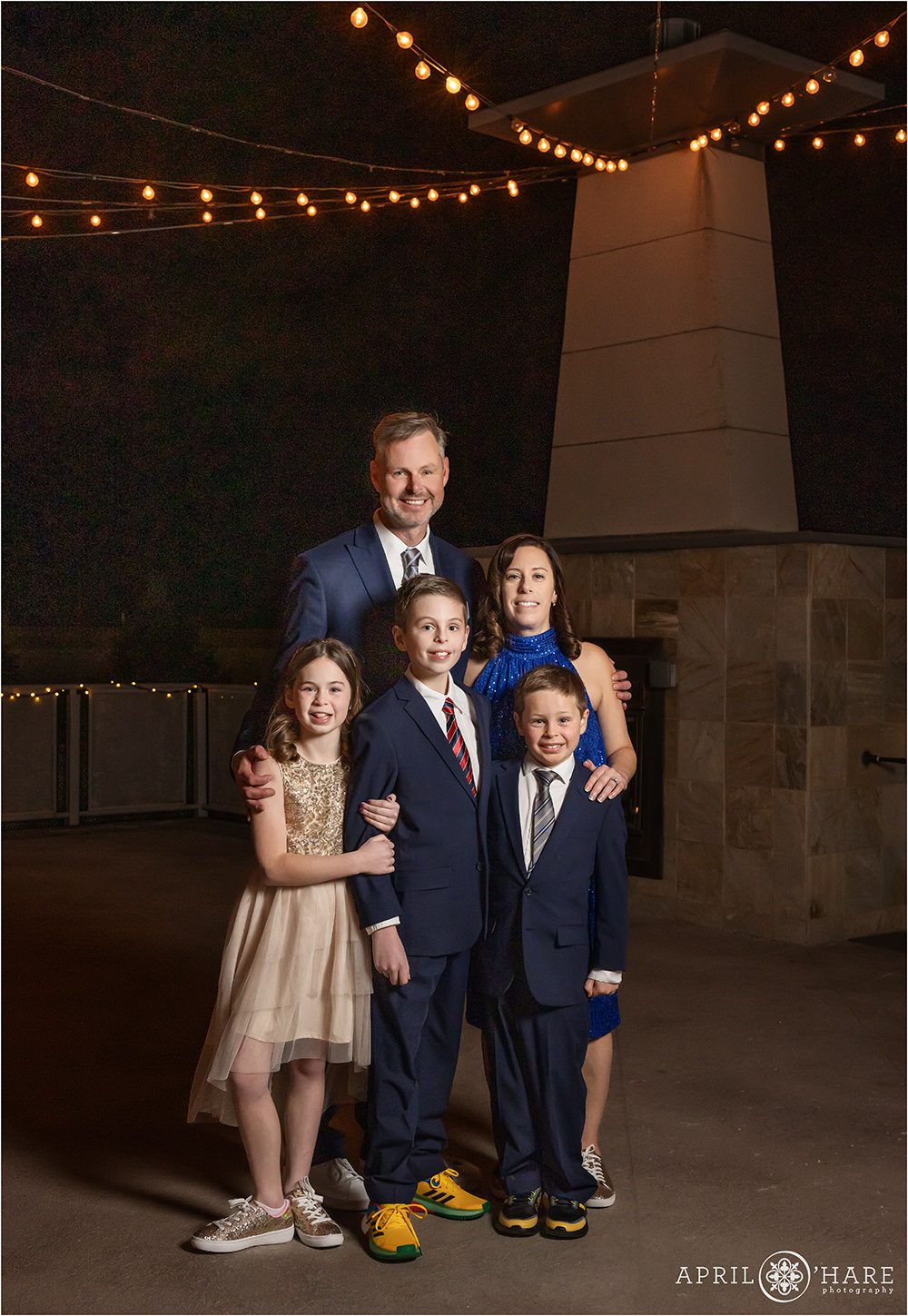Family portrait on the outdoor patio at Curtis Ballroom at their son's bar mitzvah party