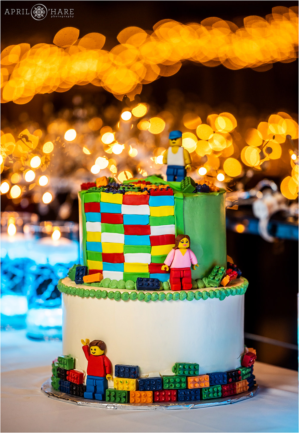 Cute two tiered Lego Cake with pretty bohek light in the backdrop at a bar mitzvah party at Curtis Ballroom in Greenwood Village