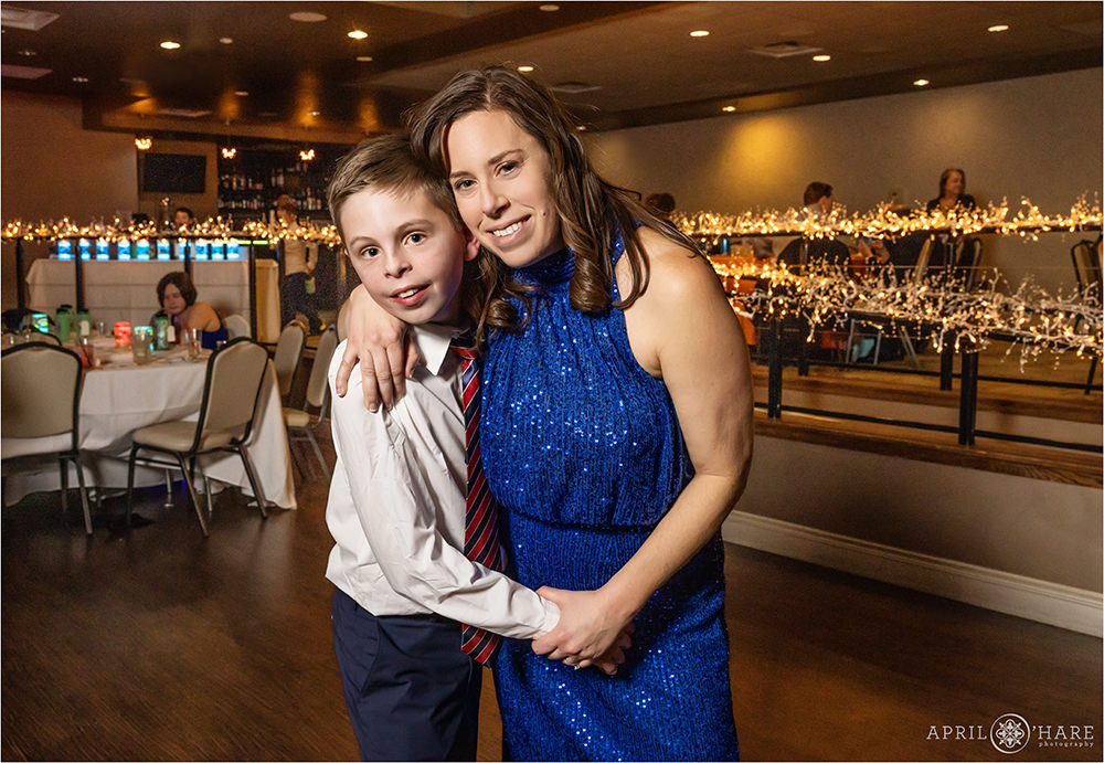 Mom and her son on the dance floor together at his bar mitzvah party at Curtis Ballroom in Greenwood Village