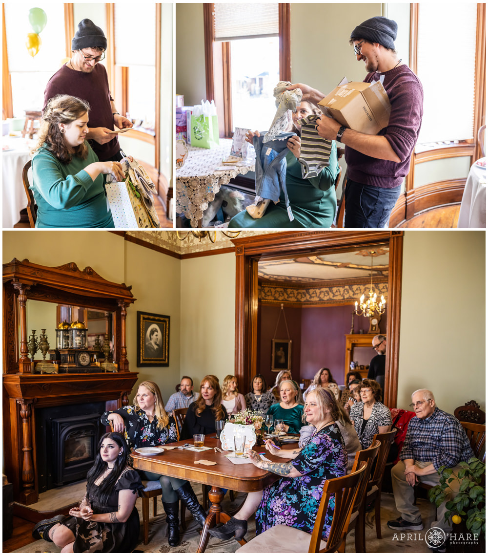 Couple open presents as their friends and family look on at Lumber Baron Inn in Denver CO