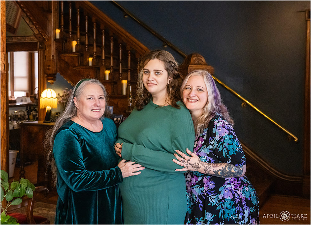 Three Generations of woman photographed together at a baby shower at the Lumber Baron Inn in Denver