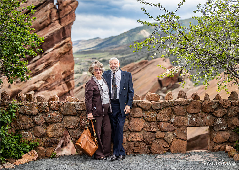 Grandparents get a cute photo together at their granddaughter's spring wedding at Red Rocks
