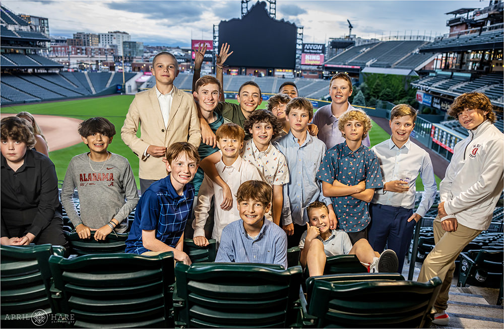Bar Mitzvah boy group photos with his friends at Coors Field