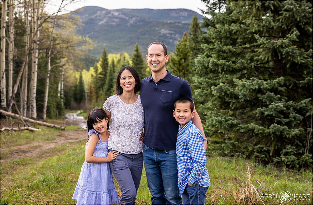 Beautiful spring time family photo in the mountains of Colorado
