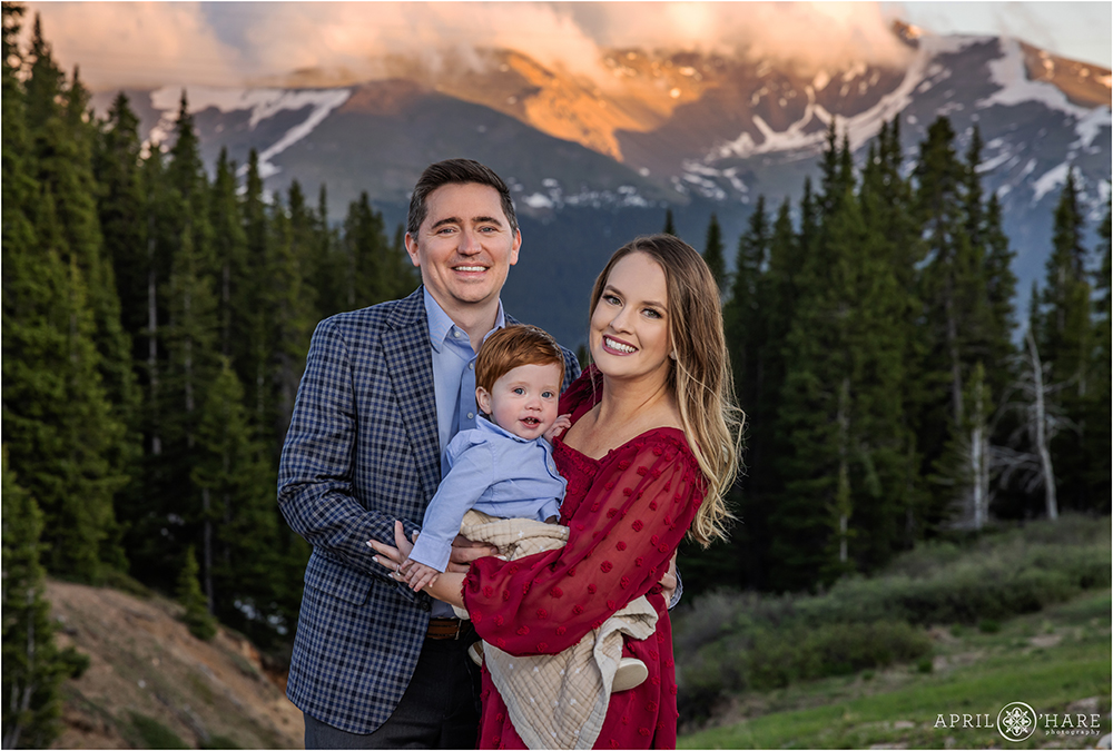 Beautiful sunset mountain backdrop for a family photo on Berthoud Pass in Colorado