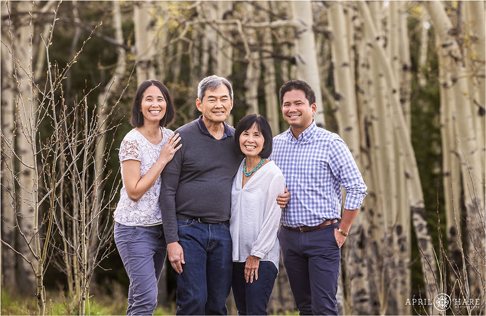 Family portraits with aspen tree backdrop in Evergreen Colorado