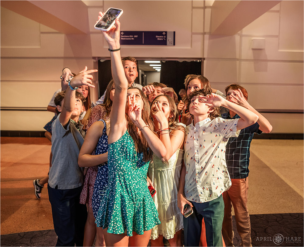 Kids get a selfie at a Coors Field Bar Mitzvah in Denver