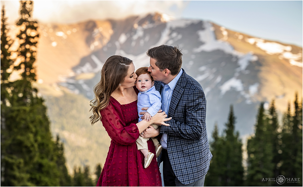 Sweet family portrait with a mountain backdrop on Berthoud Pass in Colorado