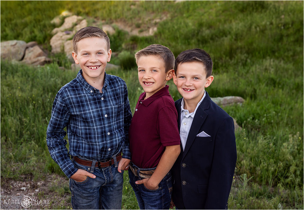 Adorable photo of three young brothers on their family farm in Franktown CO